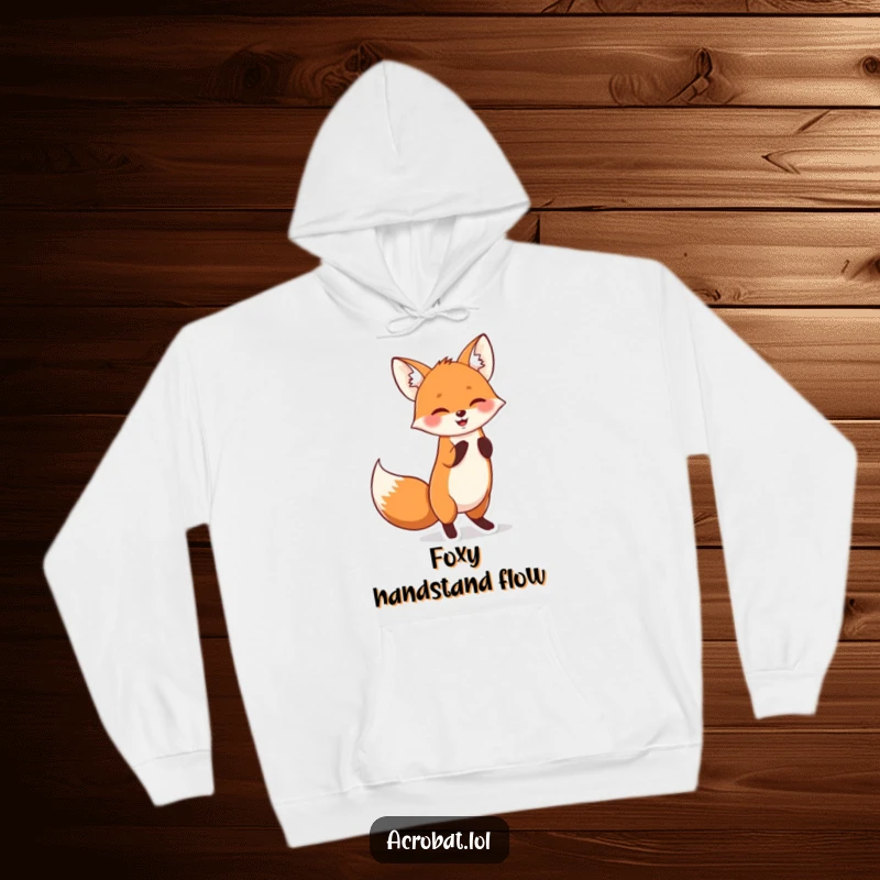 Funny hoodie displaying a cheerful fox in a handstand with its tail wagging, celebrating playful energy and fun.